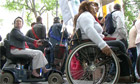 disabled protestors marching